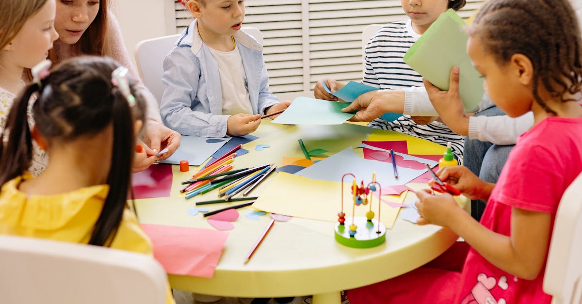 Children engaged in creative activities during an art class at a preschool, fostering learning and fun.