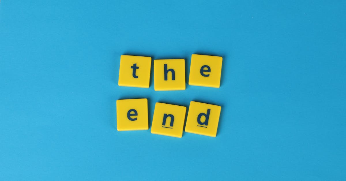 Yellow letter tiles spelling 'the end' on a vibrant blue background create a striking visual.